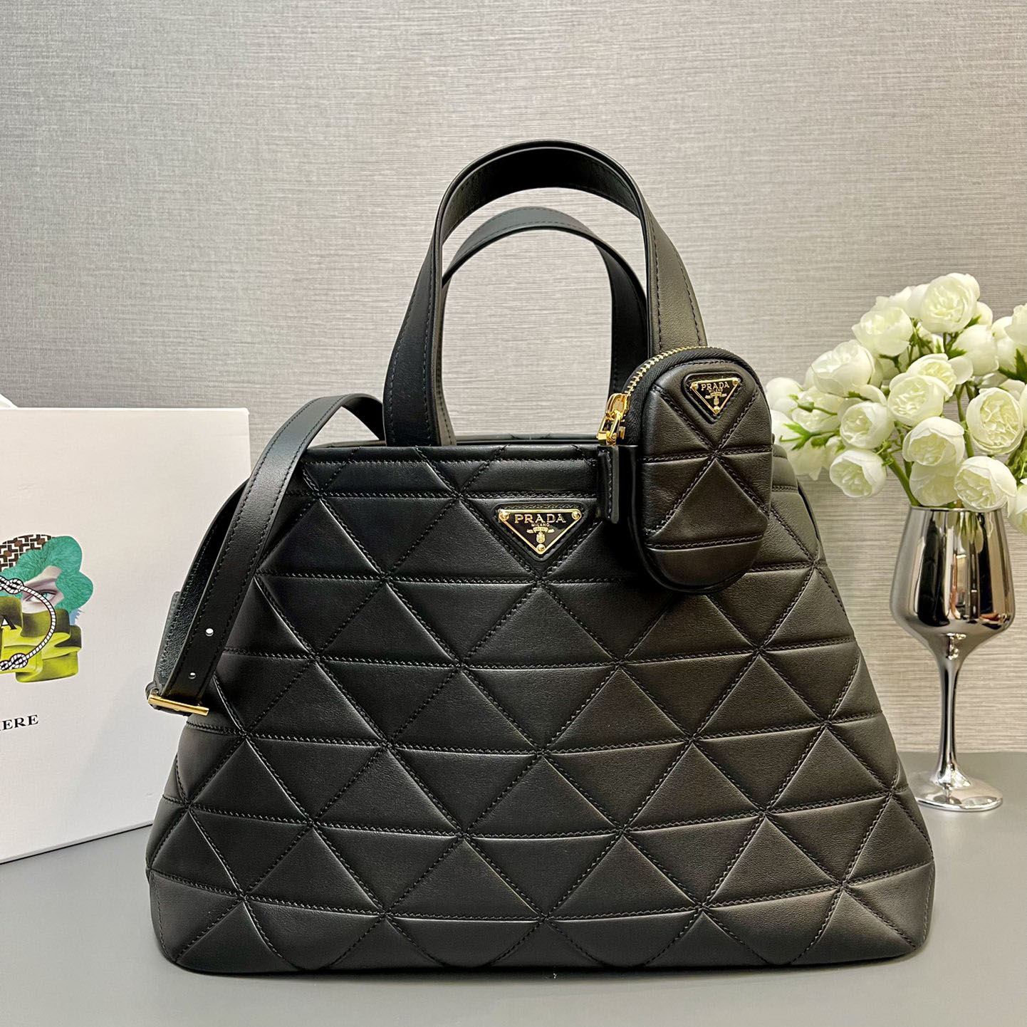 Pra*a top handle bags
